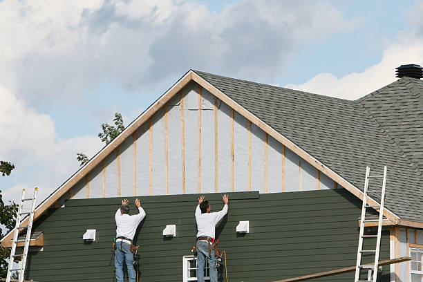 Professional Siding Replacement technician working in Bushwood, MD